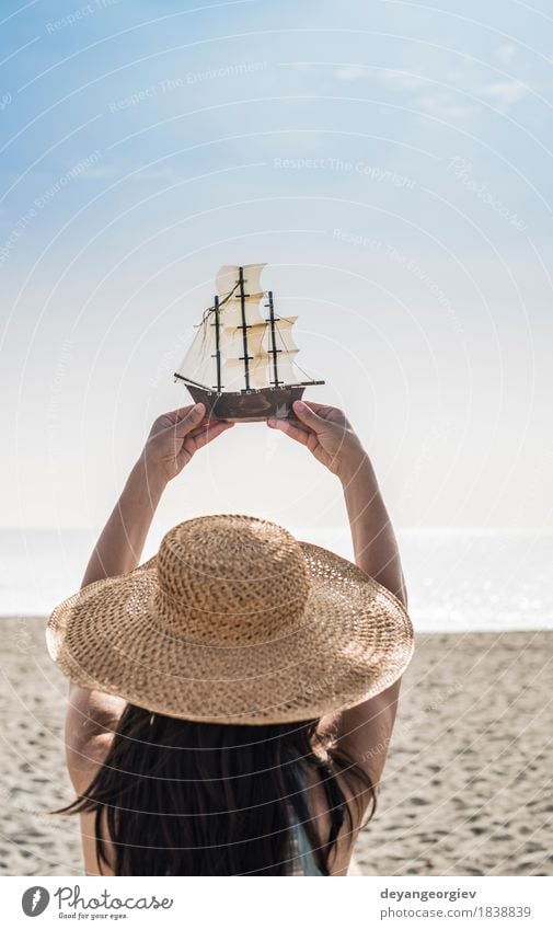 Woman with hat hold boat model Joy Happy Beautiful Vacation & Travel Tourism Summer Beach Ocean Decoration Girl Adults Hand Nature Yacht Sailboat Watercraft Hat