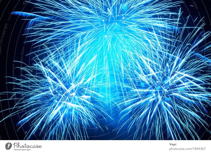 Blue colorful fireworks Joy Freedom Night life Entertainment Party Event Feasts & Celebrations Christmas & Advent New Year's Eve Art Sky Night sky Dark Bright