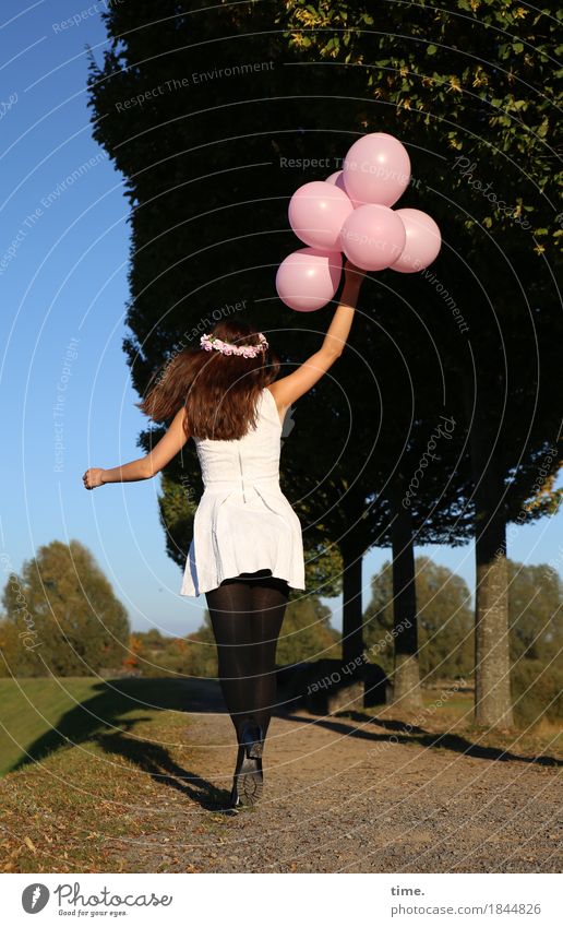 . Feminine Woman Adults 1 Human being Tree Park Lanes & trails Dress Tights Jewellery Hair circlet Balloon Movement To hold on Walking Jump Joy
