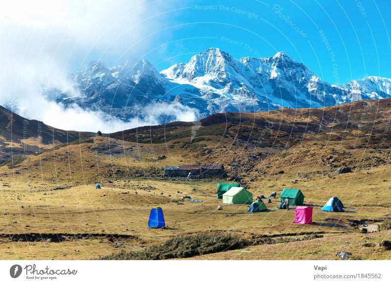Campsite with tents on the top of high mountains Vacation & Travel Camping Snow Mountain Hiking Environment Nature Landscape Sky Clouds Summer Beautiful weather