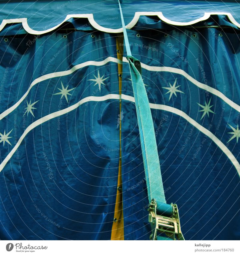stars in the manege Colour photo Exterior shot Day Circus Event Belt Tent Circus tent Blue Infancy Tent door Detail Section of image Partially visible