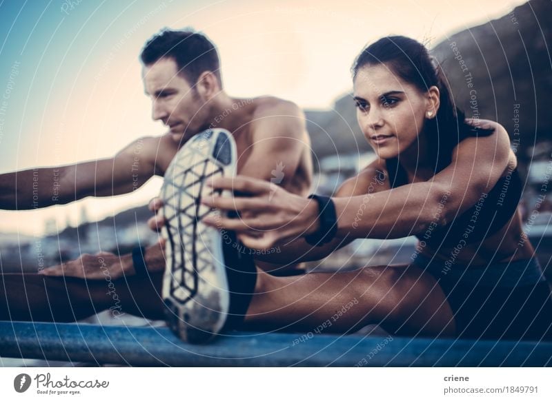 Caucasian young adult couple doing stretching after Run outdoors Joy Happy Personal hygiene Body Athletic Fitness Relaxation Sports Sports Training Sportsperson
