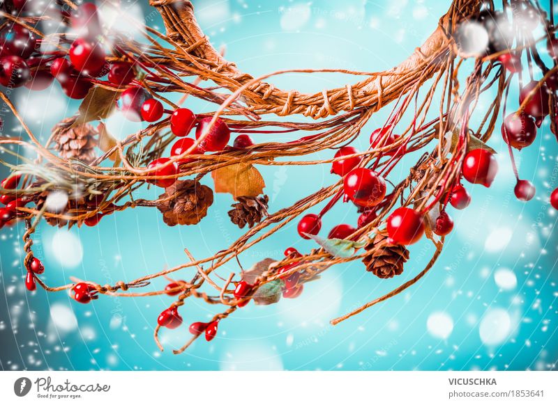 Christmas red berries wreath on blue background with snow Style Design Joy Winter Decoration Feasts & Celebrations Christmas & Advent Nature Snow Snowfall