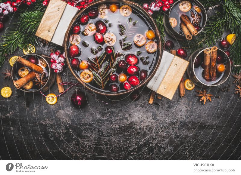 Mulled wine in a saucepan with cups and ingredients Banquet Beverage Hot drink Pot Cup Style Design Joy Winter Table Kitchen Party Event Feasts & Celebrations