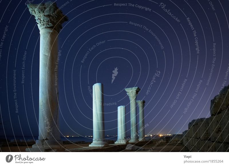 Ruins of ancient city columns under blue night sky Vacation & Travel Tourism Trip Sightseeing City trip Sculpture Architecture Landscape Sky Clouds Night sky