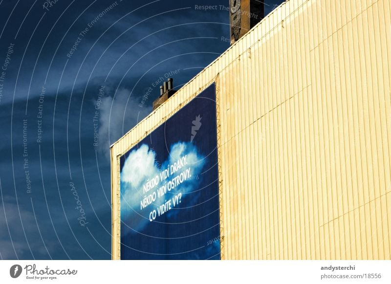 Sky on the wall Building Poster Clouds Painted Yellow Large Furrow Facade Wall (barrier) Prague Word Architecture Warehouse Advertising Graffiti Storage Blue