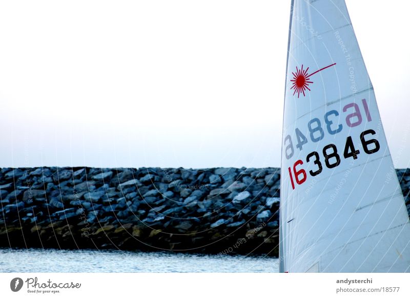 wind sailing Watercraft Ocean Lake Break water Coral Air Digits and numbers Navigation Sail Wind Rock Stone