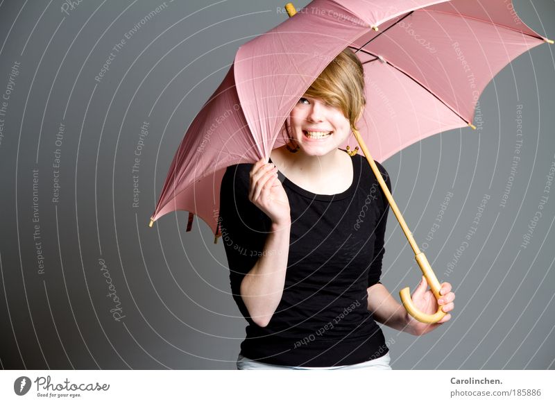 Umbrella. Umbrella. Feminine Young woman Youth (Young adults) 1 Human being 18 - 30 years Adults Rain Sweater Earring Blonde Long-haired Bangs Smiling Laughter
