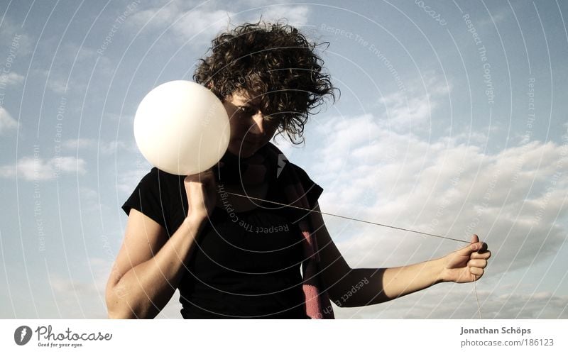 young woman with curls with balloon like clockwork Lifestyle Style Human being Feminine Young woman Youth (Young adults) 18 - 30 years Adults Sky Clouds