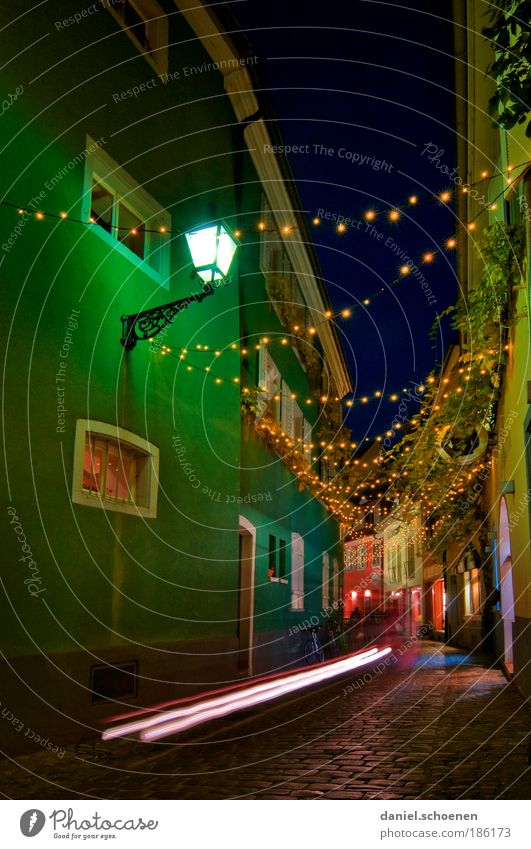 and there's always a cyclist riding through the picture. Old town Transport Traffic infrastructure Lanes & trails Blue Green Movement Freiburg im Breisgau Lamp