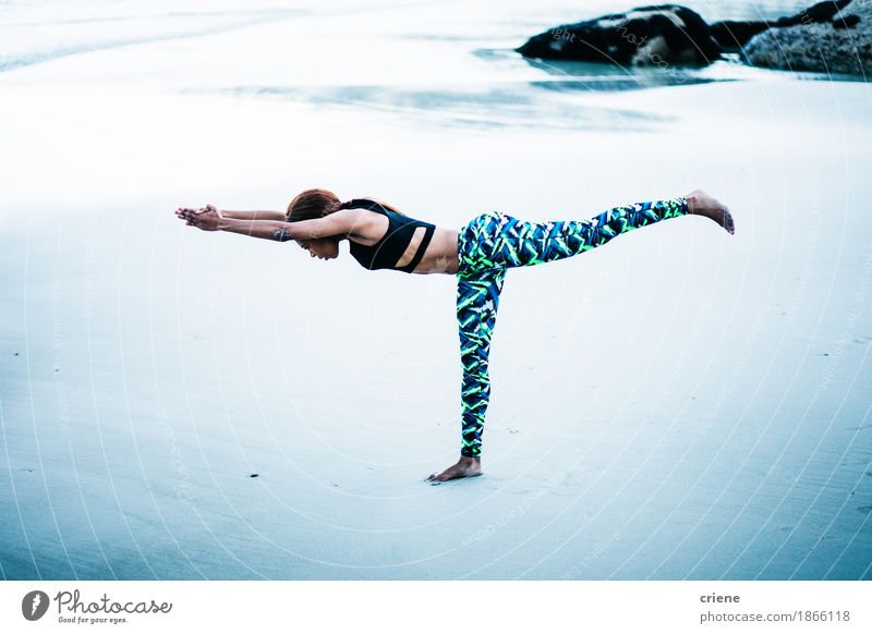 Beautiful young african women practicing yoga on beach Lifestyle Body Healthy Wellness Harmonious Well-being Relaxation Calm Meditation Leisure and hobbies