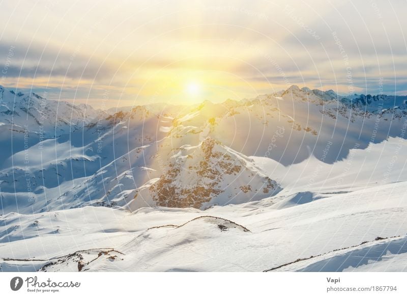 Sunset in snowy blue mountains with clouds Vacation & Travel Tourism Adventure Winter Snow Winter vacation Mountain Nature Landscape Sky Clouds Sunrise Sunlight