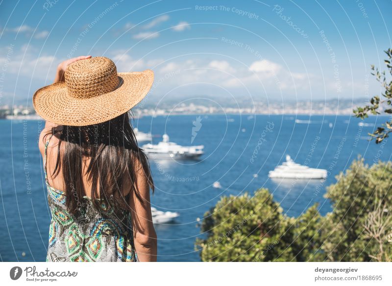 Woman with summer hat watching yachts Lifestyle Luxury Happy Beautiful Relaxation Vacation & Travel Tourism Cruise Summer Beach Ocean Human being Girl Adults