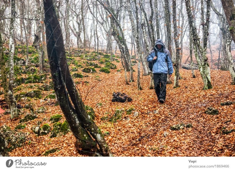 Young man in the autumn forest Lifestyle Leisure and hobbies Vacation & Travel Trip Adventure Hiking Human being Youth (Young adults) Man Adults 1 Nature