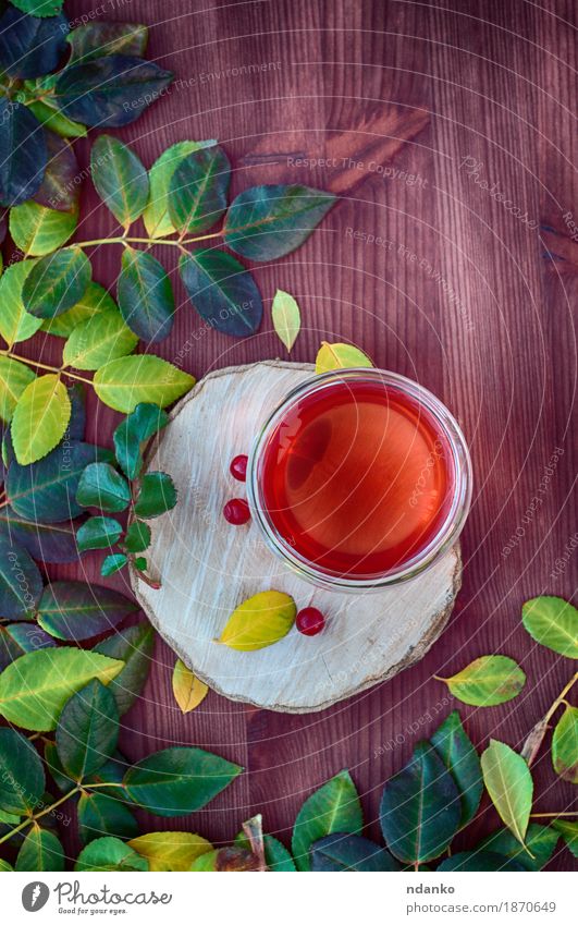 Tea with fruit, cranberry and herbs Fruit Drinking Hot drink Tree Leaf Natural background Berries cup Fallen food Fragrant glass healthy herbal hip liquid rose