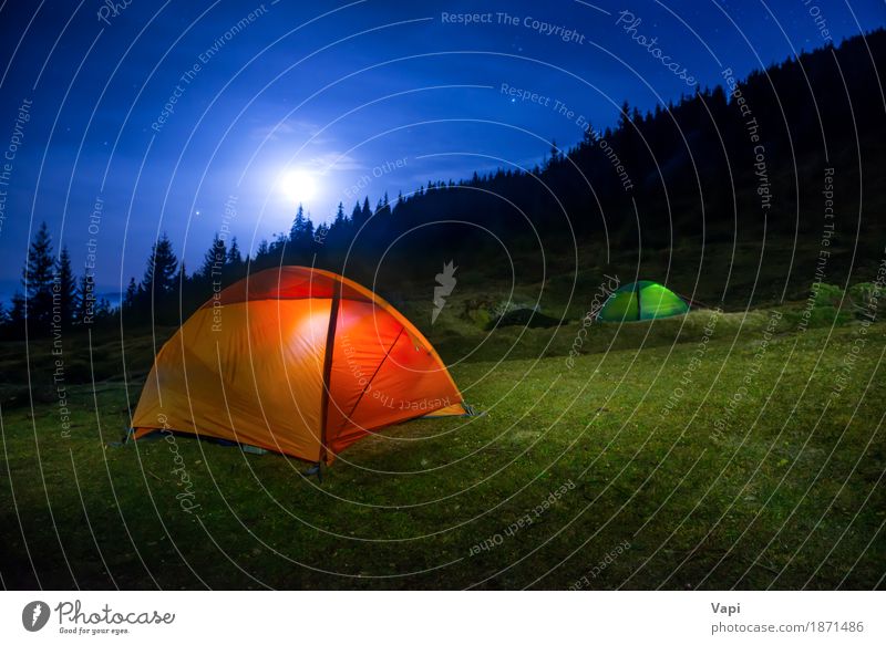 Two Illuminated orange and green camping tents under moon Vacation & Travel Tourism Adventure Expedition Camping Mountain Hiking Nature Landscape Sky Clouds