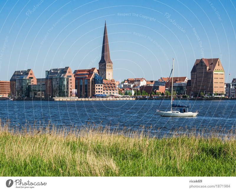 View over the Warnow to the Hanseatic city of Rostock Vacation & Travel Tourism Sailing Water Cloudless sky River Town Harbour Architecture Sailboat