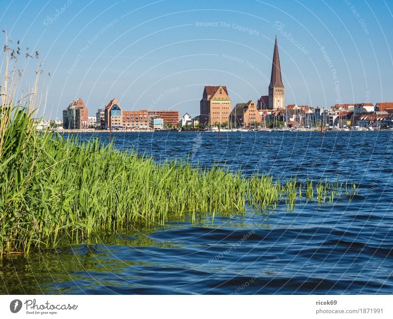 View over the Warnow to the Hanseatic city of Rostock Relaxation Vacation & Travel Tourism Nature Landscape Water Cloudless sky River Town Harbour Architecture