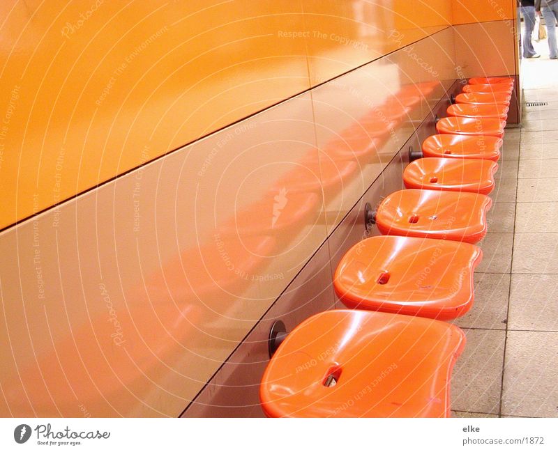 seating Seventies Seating Photographic technology Statue Orange Human being