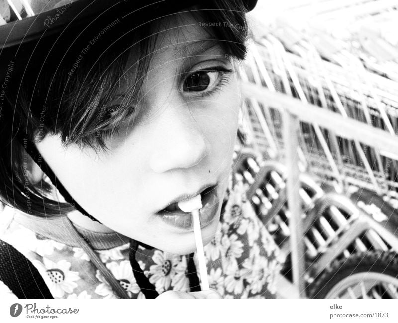 lollipop or what's left Girl Child Bike helmet Lollipop Nutrition Black & white photo