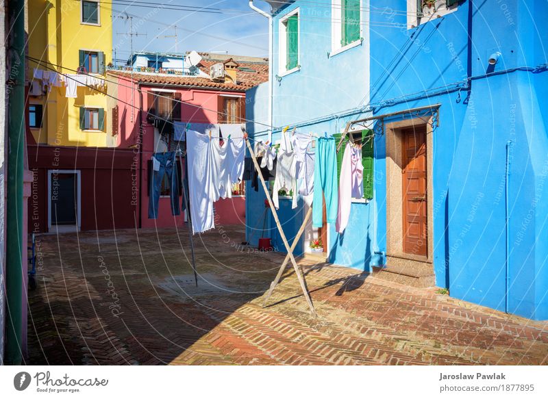 Hung laundry on the lines in front of houses in Burano. Lifestyle Vacation & Travel Tourism Summer Ocean Island House (Residential Structure) Sky Clouds