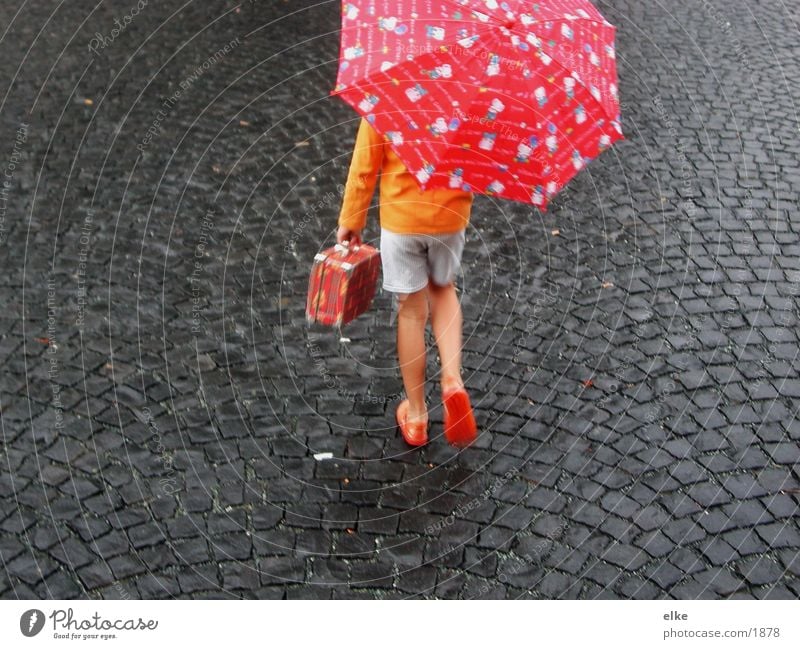 off to the south Child Going Umbrella Asphalt Human being Movement Rain Stone
