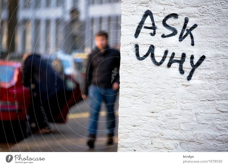 Questions cost nothing Human being Young man Youth (Young adults) Woman Adults 2 Town Populated Wall (barrier) Wall (building) Transport Motoring Pedestrian