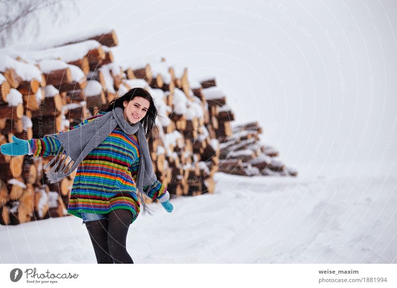 Beautiful young woman walking in winter outdoors. Wood logging Happy Far-off places Freedom Winter Snow Hiking Human being Girl Young woman Youth (Young adults)