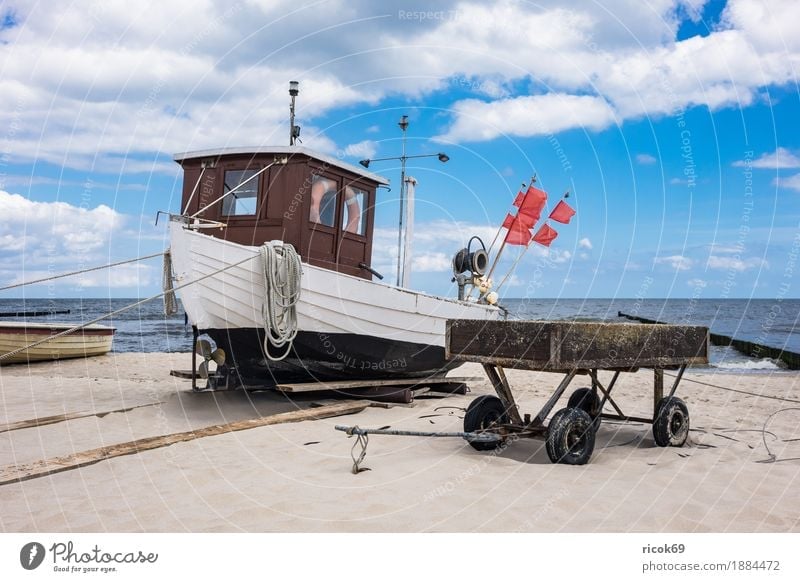 A fishing boat in Koserow on the island of Usedom Relaxation Vacation & Travel Tourism Beach Ocean Nature Landscape Sand Water Clouds Coast Baltic Sea
