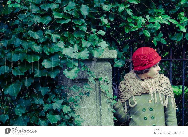 In thought Human being Feminine Young woman Youth (Young adults) Woman Adults Looking Hat Ivy Wild Old Old fashioned Retro Gate Garden Park Coat Gloves