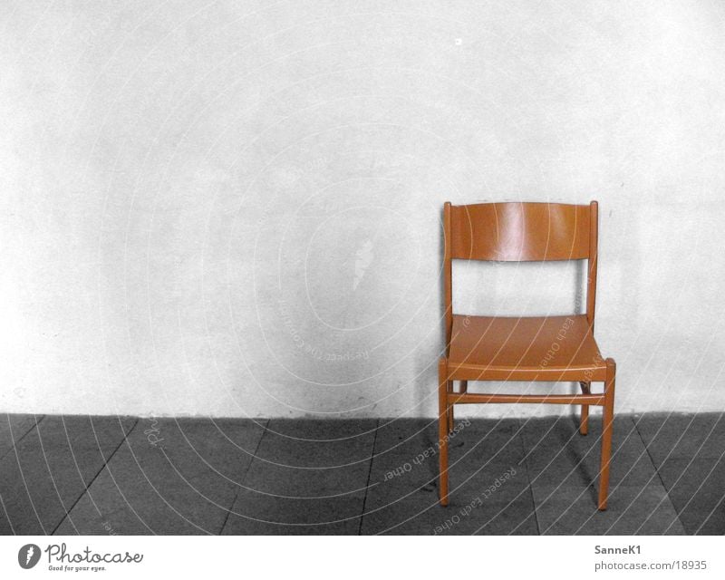one chair Seating Wooden chair Wall (building) Living or residing Chair Sit Black & white photo