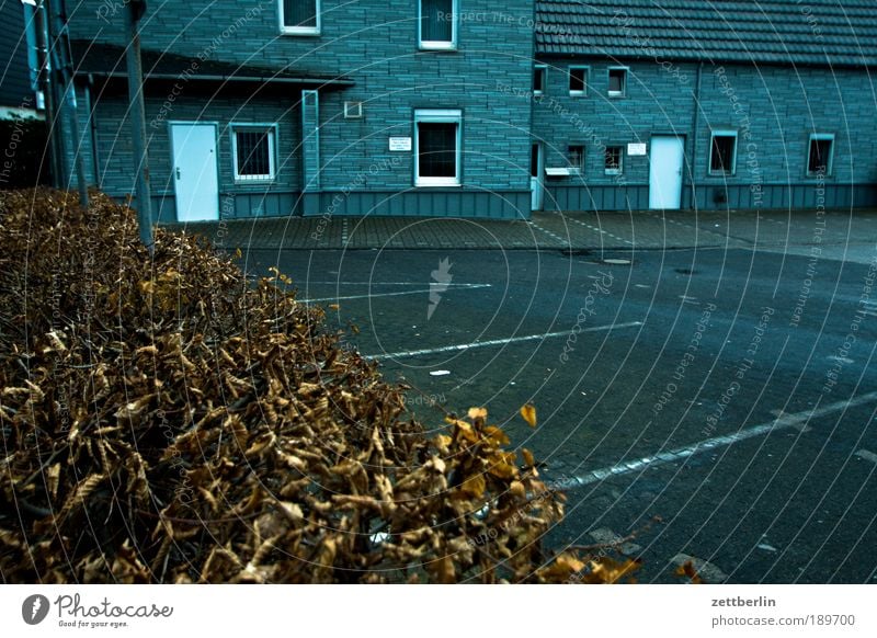 Wickede Parking lot parking lot marking House (Residential Structure) Building Architecture Entrance Hedge Autumn Winter Death Motionless Gloomy Sadness Grief