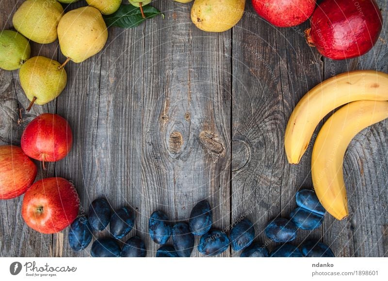 Fresh ripe fruits are laid out on the perimeter Fruit Apple Candy Vegetarian diet Diet Healthy Eating Summer Garden Table Nature Autumn Wood Delicious Natural