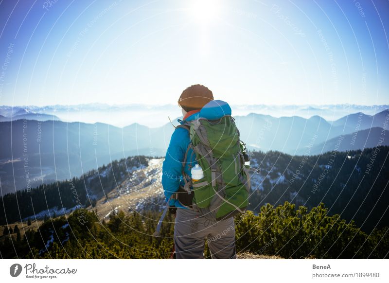 Hiker with rucksack looking over Alps and mountain range Relaxation Vacation & Travel Sports Woman Adults Nature Fitness Discover Leisure and hobbies Alpine