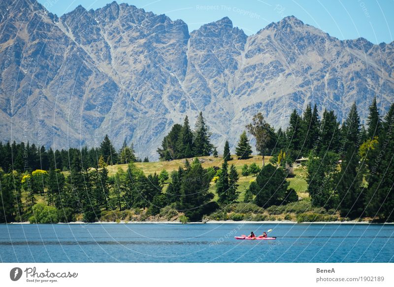 Kayak rider in front of mountain range Remarkables in New Zealand Leisure and hobbies Vacation & Travel Sports Human being Nature Adventure Loneliness
