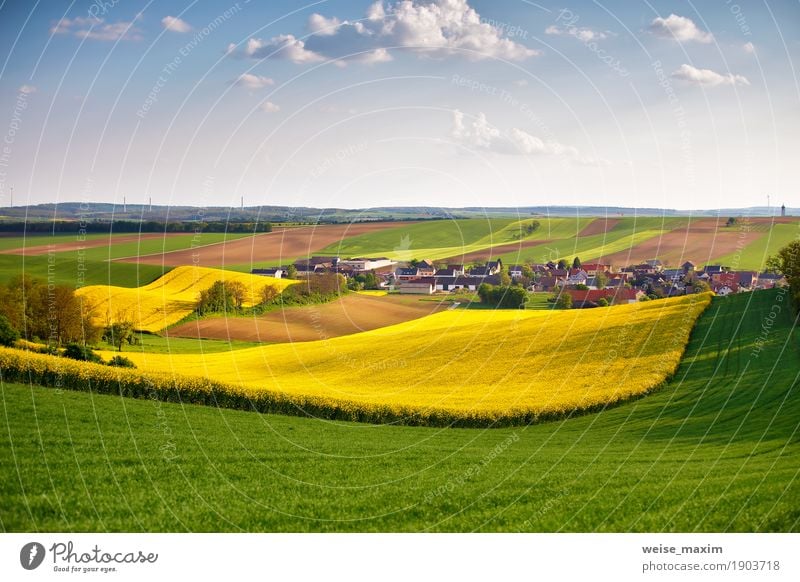 Austria spring green and yellow colza fields. Village on hills. Vacation & Travel Tourism Trip Far-off places Freedom Summer Living or residing