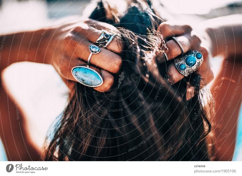 Close up of Women with bohemian style Jewelry rings Lifestyle Luxury Elegant Style Design Exotic Beautiful Hair and hairstyles Swimming pool Summer Beach