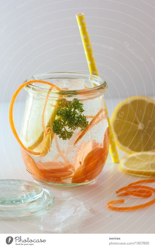 Delicious soft drink with carrot, lemon and parsley on white table Cold drink Lemon Carrot Parsley Vegetable Fruit Organic produce Beverage Drinking