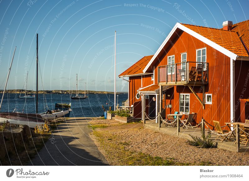 houses and fishing boats in a Norwegian port Sun House (Residential Structure) Garden Hiking Nature Water Sky Waves North Sea Norway Fishing village Dream house