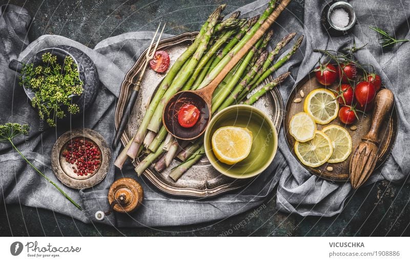 Asparagus and ingredients on a rustic kitchen table Food Vegetable Herbs and spices Cooking oil Nutrition Lunch Dinner Banquet Organic produce Vegetarian diet