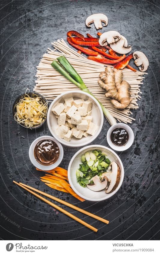 Asian ingredients and chopsticks with tofu and noodles Food Vegetable Herbs and spices Nutrition Lunch Dinner Buffet Brunch Organic produce Vegetarian diet Diet
