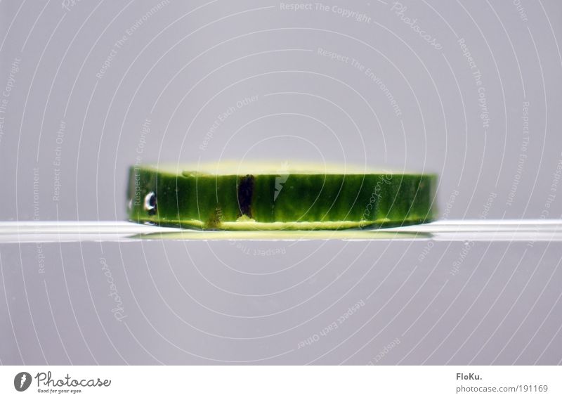 inverted world Food Vegetable Organic produce Vegetarian diet Glass Wet Green White Healthy Pure Whimsical Water Cucumber Air bubble Surface of water