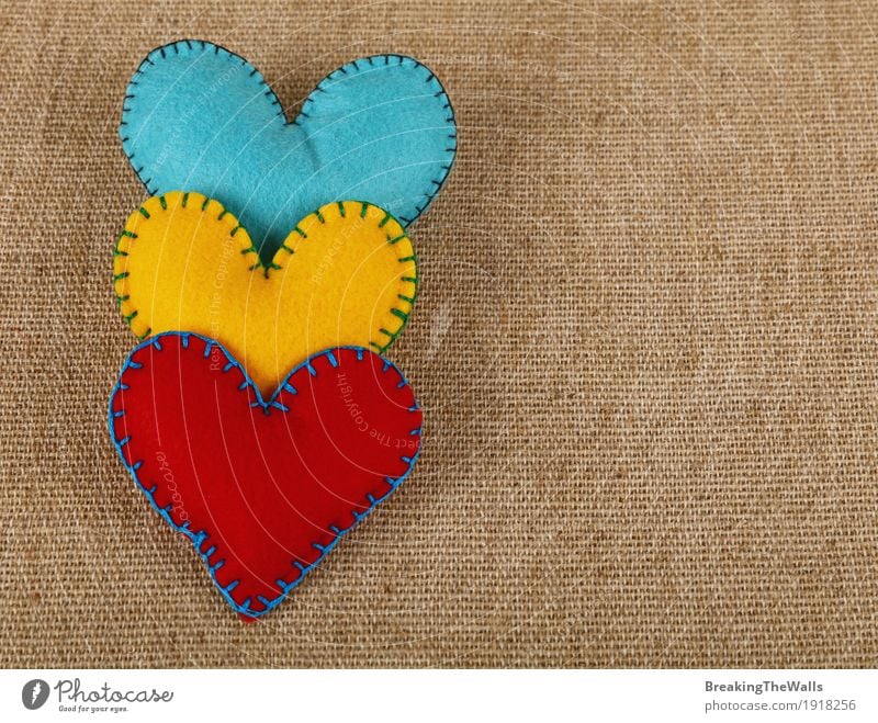 Three stitched hearts, yellow, red and blue on canvas Leisure and hobbies Handicraft Handcrafts Valentine's Day Wedding Family & Relations Art Cloth Heart Love