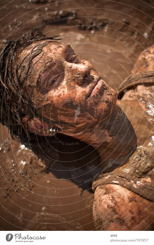 mud fight Hair and hairstyles Skin Face Mud Muddy Mud bath Summer Sun Beach Young woman Youth (Young adults) 1 Human being Observe To enjoy Lie Exceptional
