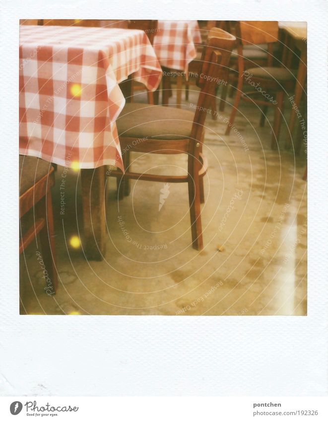 Polaroid shows tables and chairs in a restaurant. guest room. Red and white checked tablecloth. Vacation & Travel Tourism Trip Arrange Interior design