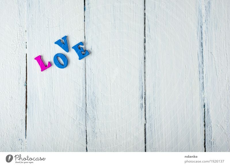 white wooden background with the word love in wooden letters Feasts & Celebrations Valentine's Day Wedding School Toys Love Retro Blue Pink White Idea alphabet