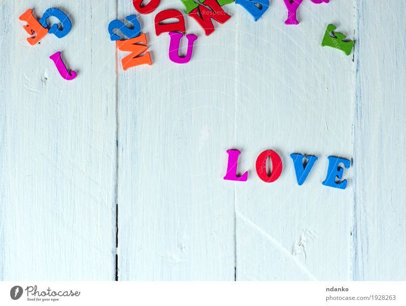 white wooden background with the word love Feasts & Celebrations Valentine's Day Wedding School Toys Wood Characters Love Blue Pink Red White Idea letter