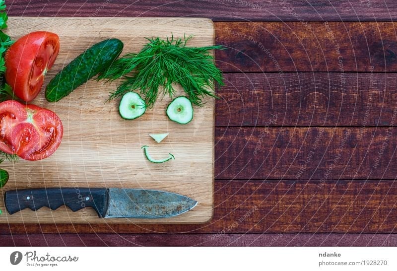 smiley face made of pieces of fresh vegetables Vegetable Herbs and spices Vegetarian diet Knives Wood Diet Eating Fresh Delicious Funny Cute Brown Green Red