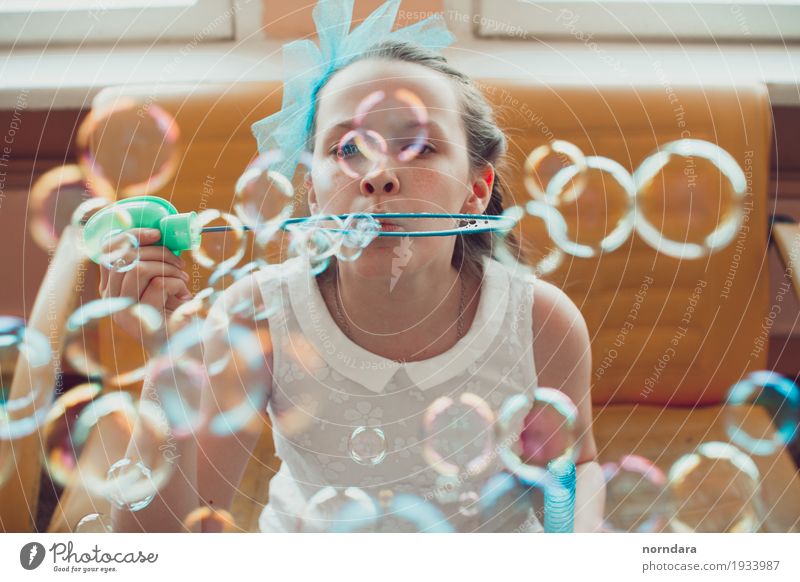 little girl and soap bubbles Leisure and hobbies Girl 8 - 13 years Child Infancy To enjoy Happy Emotions Enthusiasm Euphoria Playing Soap bubble Schoolchild