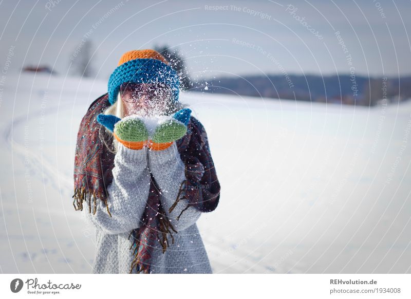 Jule | woman blows snow with cap and gloves Lifestyle Leisure and hobbies Human being Feminine Young woman Youth (Young adults) Woman Adults 1 18 - 30 years